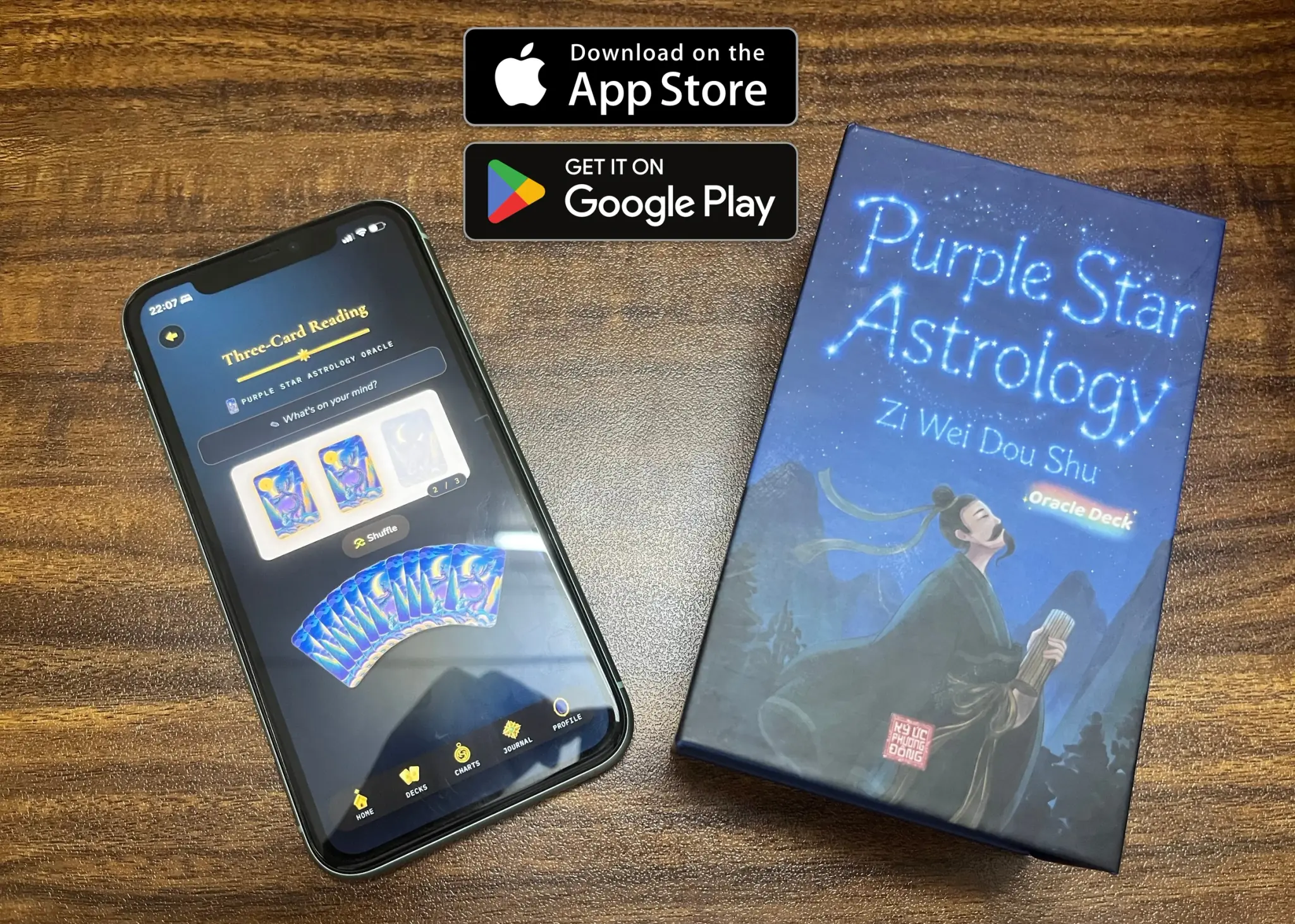 The physical deck and guidebook beside the Orim app.